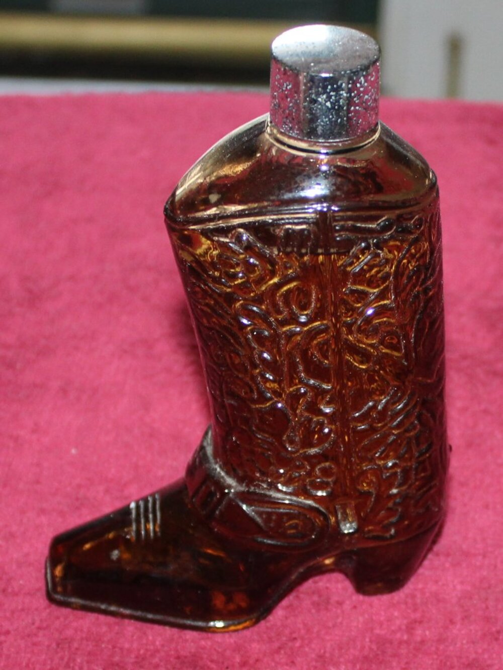 Vintage Avon Western Boot decanter featuring amber glass